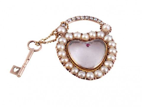 A rock crystal, cultured pearl and ruby locket, circa 1800, the heart...