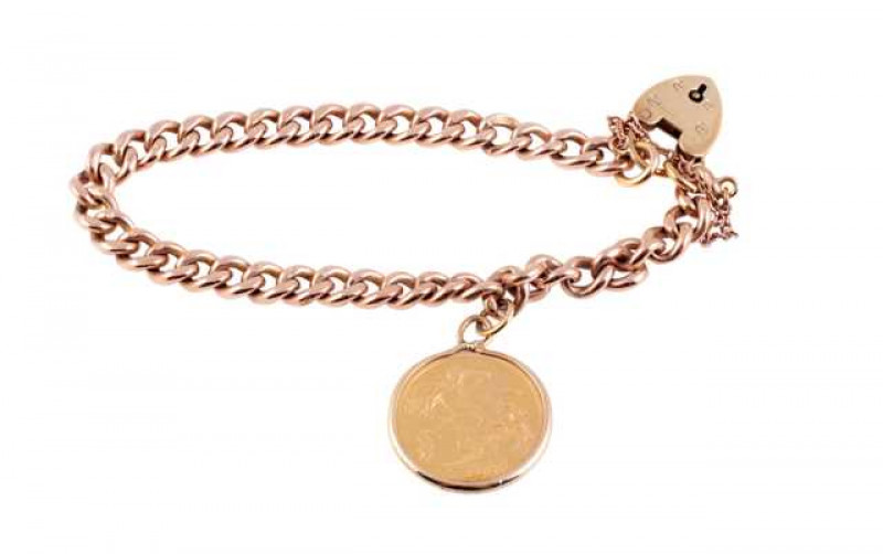 A 9 carat rose gold curblink bracelet, suspending a Victorian half sovereign, 1897, with 9 carat yellow gold padlock clasp. Total weight approximately 23 grams, length 18.5cm
