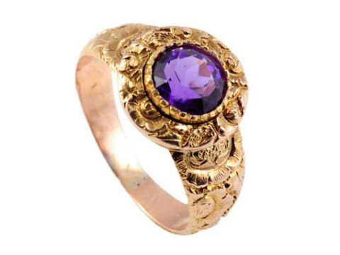 A 19th Century amethyst ring, the round mixed cut amethyst collet set...
