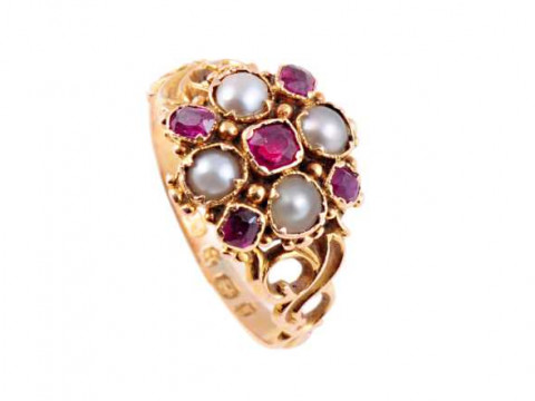 A ruby and seed pearl ring, circa 1870, the square cut ruby collet set...