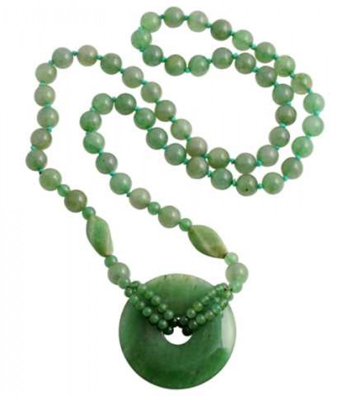A jadeite necklace, the sixty seven beads suspending a larger disc shaped jadeite set to the top with two double rows of twenty eight smaller jadeite beads. Weight approx. 123.9gms. Length approx. 42cm