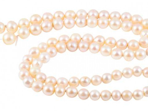 A cultured pearl necklace, the single strand of eighty three slightly...