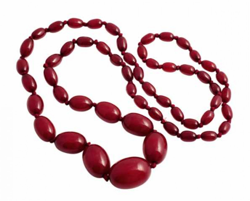 A single strand of fifty five graduating amber beads, strung simply without a clasp. Weight approx. 58.1gms. Length approx. 43cm. NB These beads have not been tested for enhancement.