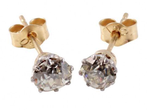 A pair of simple diamond ear studs, the old brilliant cut diamonds eight...
