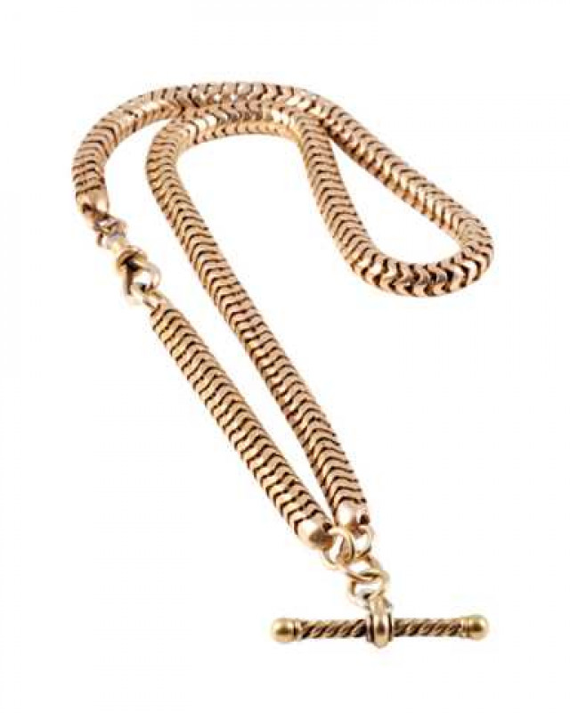 A Victorian watch chain, the thick snake link chain held by an Albert clasp, suspending a twist design T bar on an articulated link. Total weight approx. 32.1gms. Length approx. 19.3cm