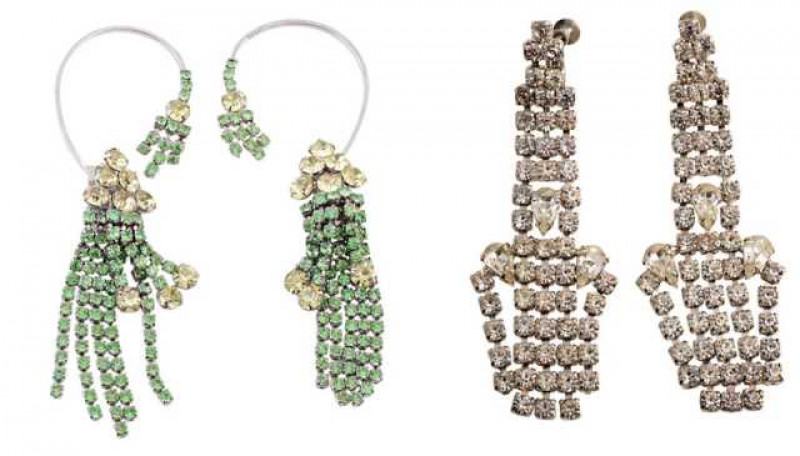A pair of paste set earrings, circa 1920, set to the bottom with five strands of green round cut claw set paste stones, all on articulated links with three strands set to the bottom with larger yellow paste claw set stones, all suspending from a cluster o