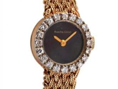 A lady's Bueche Girod 9 carat gold and diamond wristwatch, the bezel set...