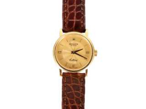 A lady's Rolex Cellini 18 carat gold wristwatch, with baton and Roman...
