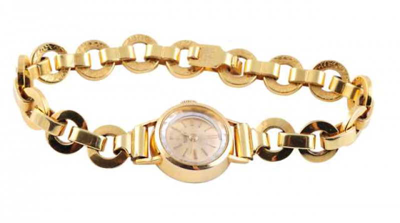 A lady's Tudor wristwatch, the circular dial with baton numerals, the bracelet strap composed of rings.