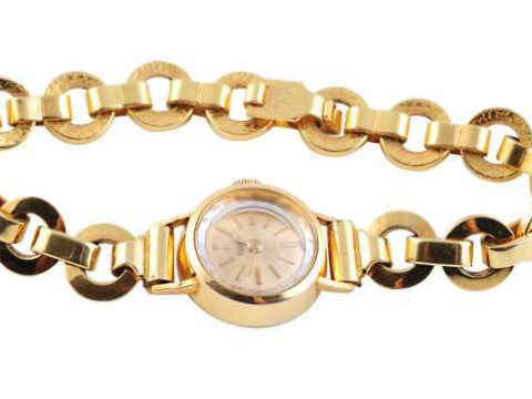 A lady's Tudor wristwatch, the circular dial with baton numerals, the...