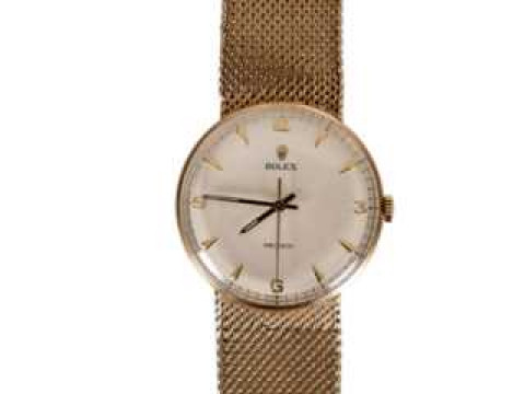 A Gentleman's Rolex Precision wristwatch, with centre sweep seconds, the...