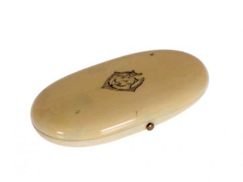 A French ivory etui, 19th Century, fitted with Palais Royale type gilt...