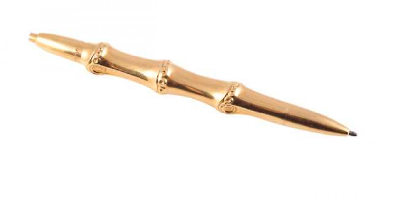 A Dunhill 18 carat gold ballpoint pen, import marks, in original Dunhill fitted case. Gross weight approximately 42 grams, 13.5cm