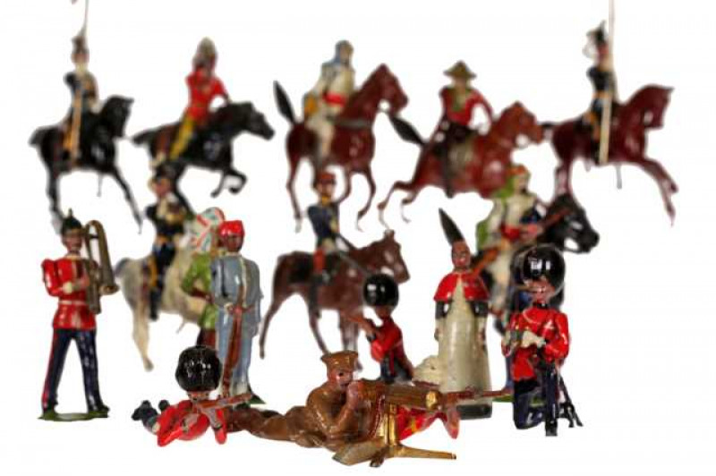 A large collection of painted lead toy soldiers, mostly Britains, including jointed examples.