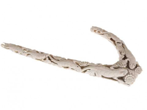 An unusual antler horn carving of lizards, circa 1900, the reptiles finely...