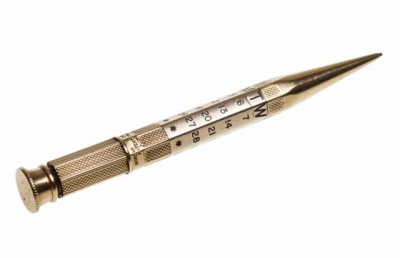 Mordan, a 9 carat gold 'Everpoint' propelling pencil with calendar, with engine turned barrel and blue enamel calendar. Approximately 20 grams, 9.5cm