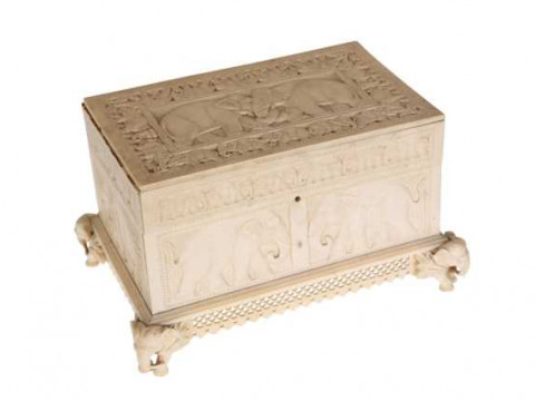 An Indian ivory box, circa 1900, of rectangular form, carved throughout...