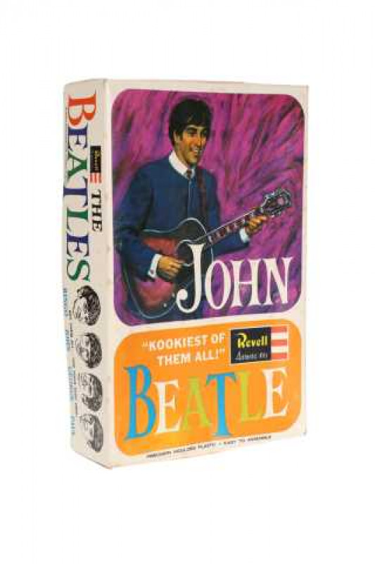 A Revell Beatle moulded plastic construction kit, John Lennon, the contents in their original wrapper.