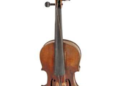 A full size violin, with two piece back, bears paper label Joseph Guarnerius...,...