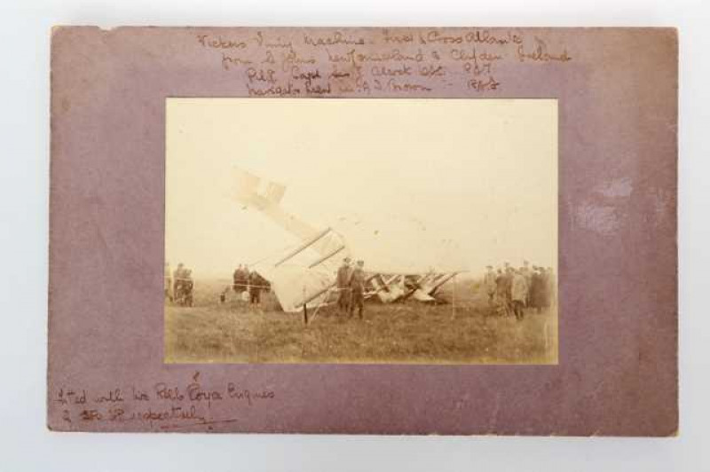 John Alcock (1892-1919), English pilot, and Arthur Whitten Brown (1886-1948), British navigator: two inscribed photographs of the famous duo, mounted on card. Largest photograph 112mm by 153mm  Note:  Alcock and Brown completed the first successful non-st