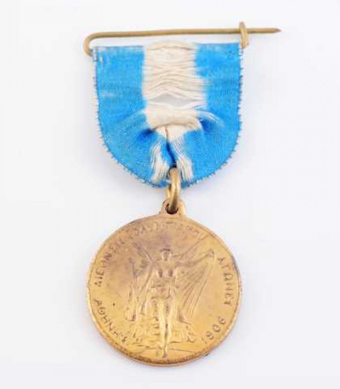 A gilt metal medal, possibly relating to the Intercalated Games, Athens 1906, with blue and white ribbon.