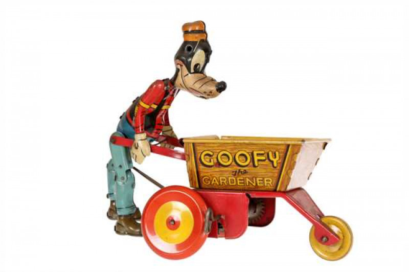 Marx: A tinplate and clockwork toy, 'Goofy the Gardener', ears missing. 18cm high