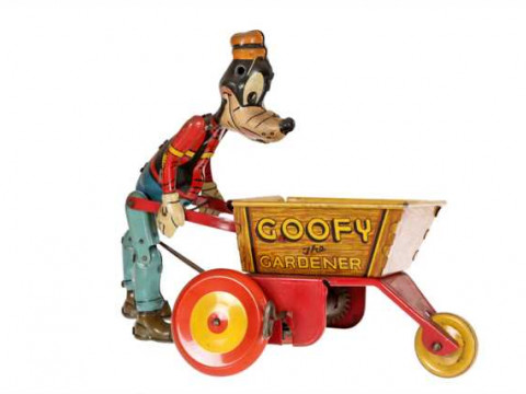 Marx: A tinplate and clockwork toy, 'Goofy the Gardener', ears missing....