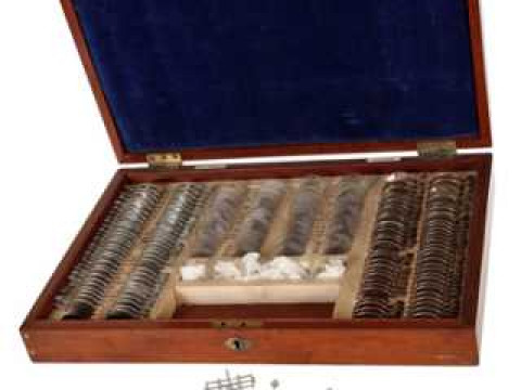 A mahogany optometrists box, circa 1890, the hinged cover with inset panel,...