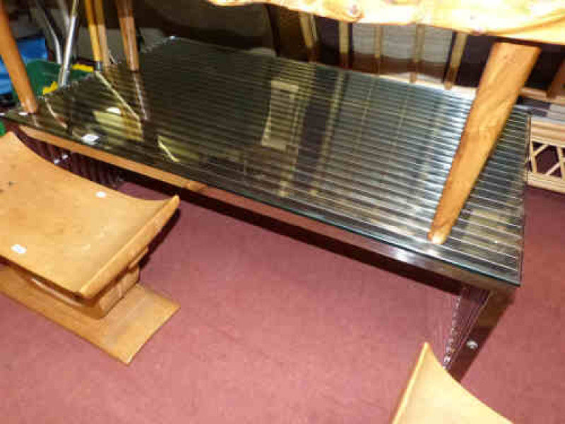 Contemporary glass topped and chrome finish coffee table
