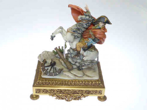 Capo di monte signed ceramic figure of Napoleon on rearing horse, mounted...