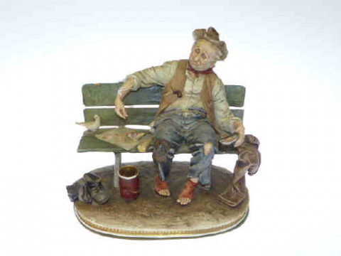 Capo di monte tramp on bench figure