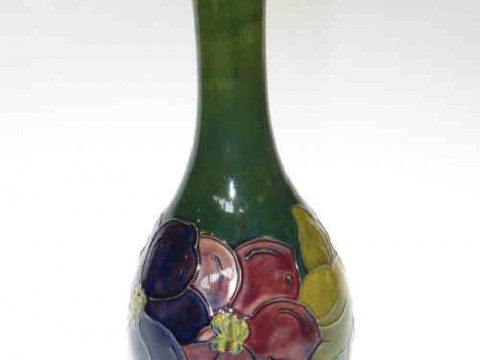 Moorcroft clematis bottle vase, shaded green/blue ground, 27cm