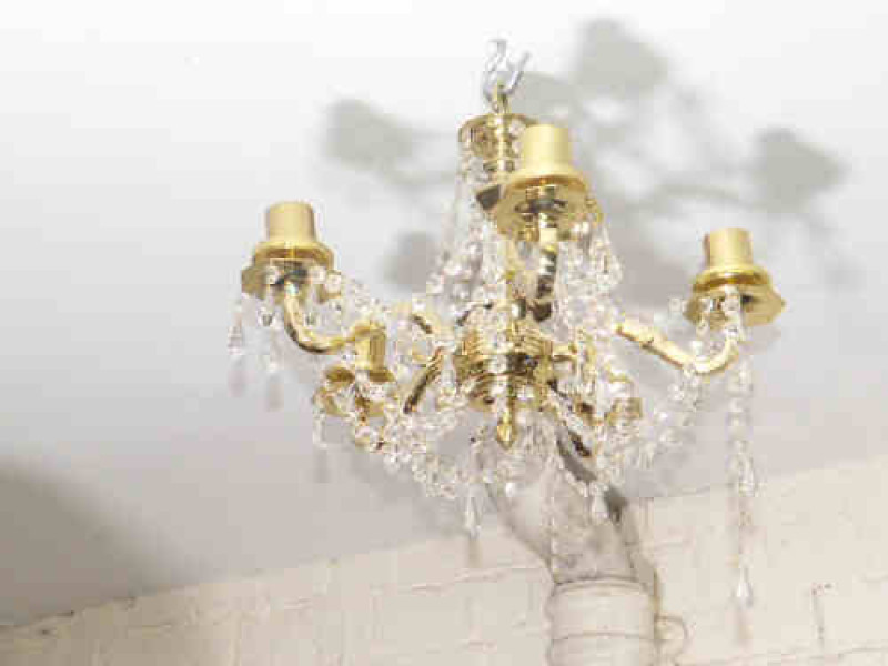 Four gilt metal and glass lustre drop light fittings