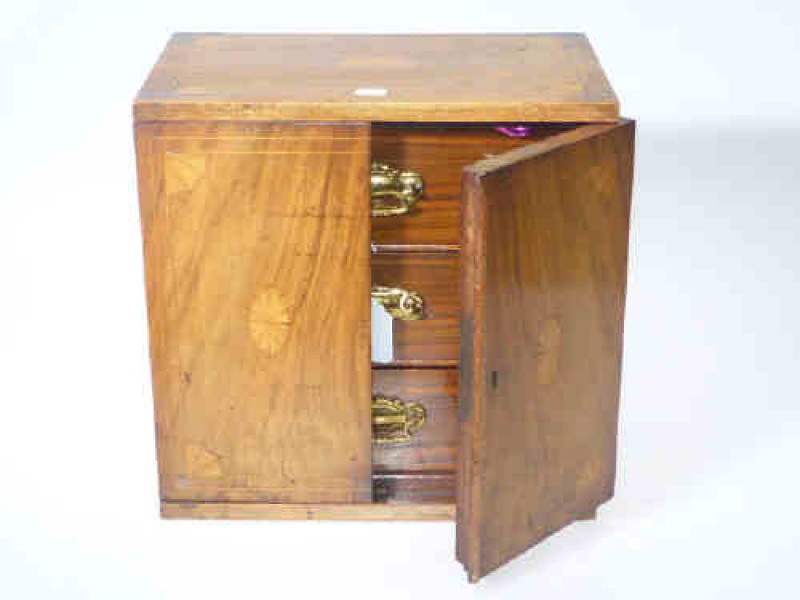 Edwardian inlaid walnut table top mini chest of three drawers behind twin doors