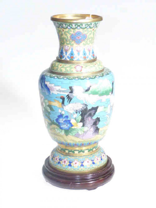 Large cloisonne vase with wading bird and floral design on wood stand, 34cm high