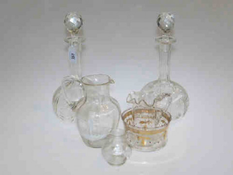 Pair of cut glass decanters, Mary Gregory jug and small jug, gilt decorated...