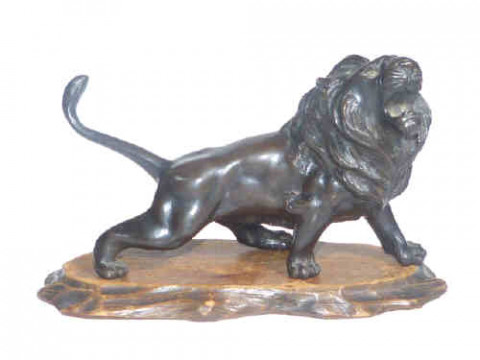 Japanese bronze model of a lion on wood plinth with signature underneath...
