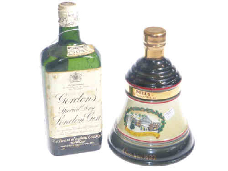 1950's bottle of Gordon's Gin and Bell 1990 Christmas issue Bell decanter