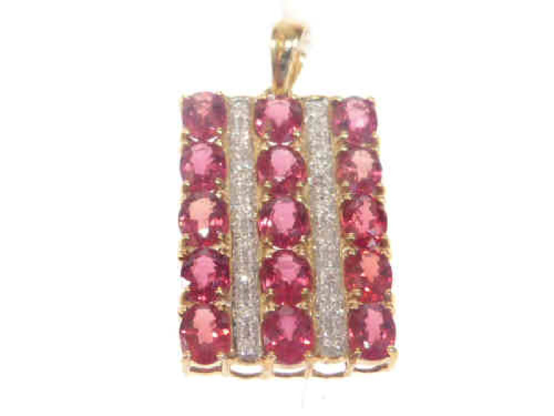 9ct gold pendant set with diamonds and beryllium sapphires