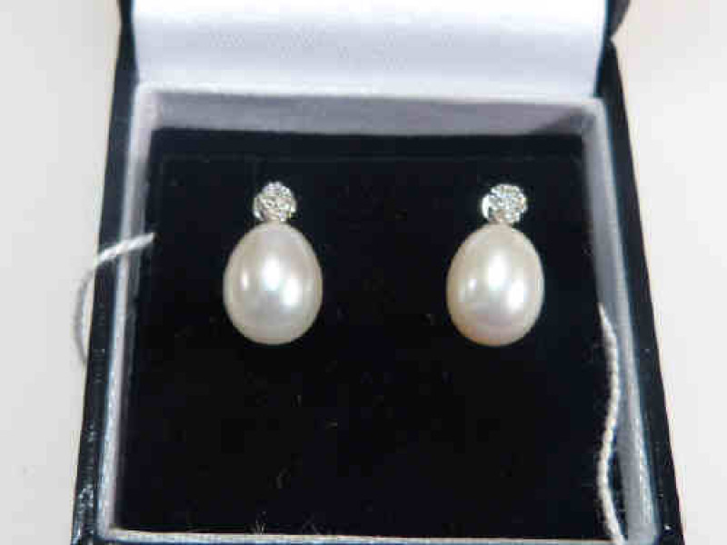 Pair of cultured pearl and diamond earrings, stamped 375