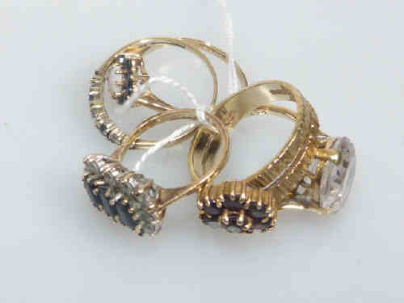 Five hallmarked 9ct gold rings, gross 14 grams