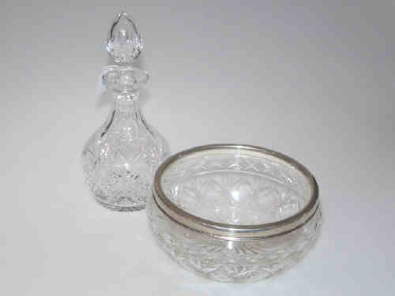 Silver rimmed glass bowl, London 1941; and a Stuart crystal decanter (2)