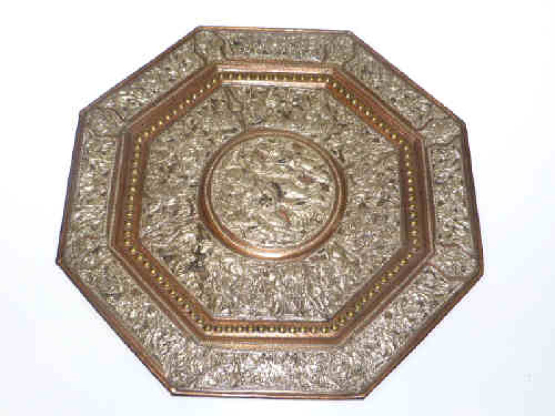 White metal on copper octagonal charger, probably Indian
