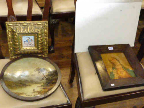 Circular painted tin plaque, unframed Indian studies and two pictures