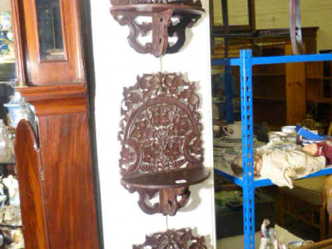 Set of three Anglo-Indian pierced and carved hardwood wall brackets