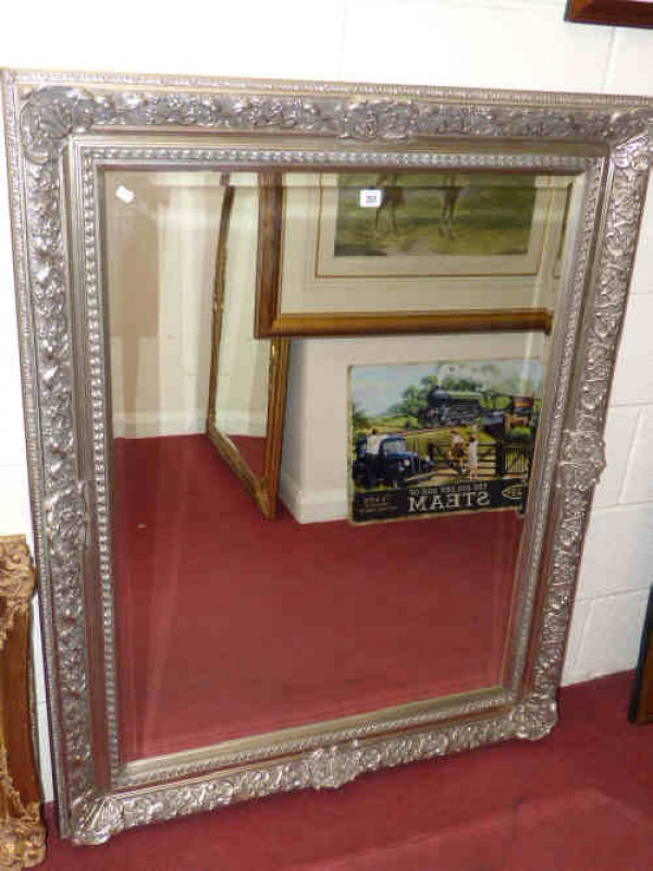 18th Century style mirror with moulded and silvered frame