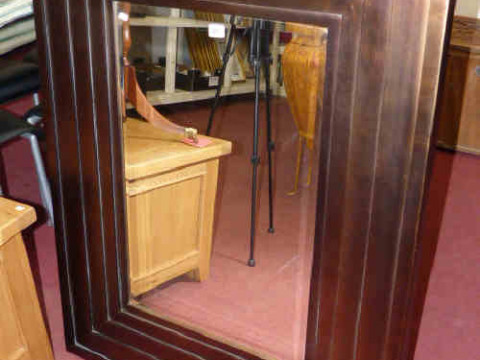 Contemporary mirror, with bronzed and stepped frame
