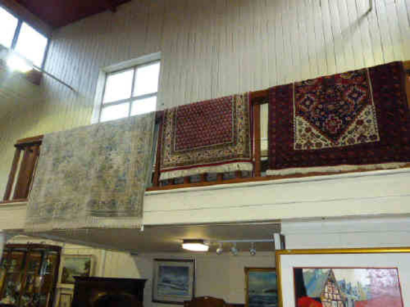 Green ground floral patterned Chinese rug 2.34 x 1.63, red ground Persian design rug 1.63 x 0.92 and a blue ground Belouch rug 2.00 x 1.05 (3)