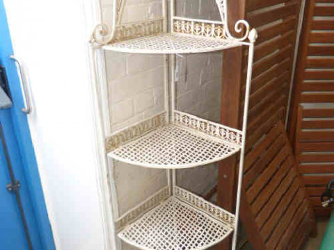 Wrought metal folding four tier corner plant stand