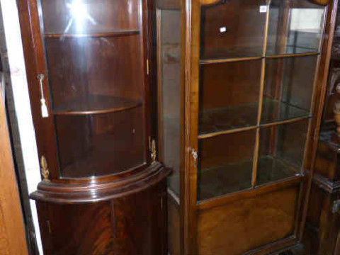 Walnut arched top china cabinet and mahogany bow front corner cabinet...